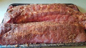 Pork Ribs given a heavy coat of dry rub before wrapping!